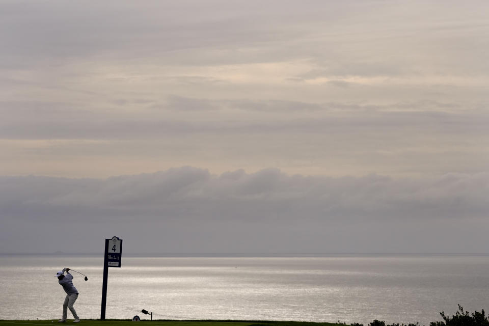 Ryan McCormick hits his tee shot on the fourth hole of the South Course at Torrey Pines during the first round of the Farmers Insurance Open golf tournament,Wednesday, Jan. 24, 2024, in San Diego. (AP Photo/Gregory Bull)