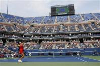 Ana Ivanovic of Serbia (L) serves to Christina McHale of the U.S. at the U.S. Open tennis championships in New York August 31, 2013. REUTERS/Ray Stubblebine