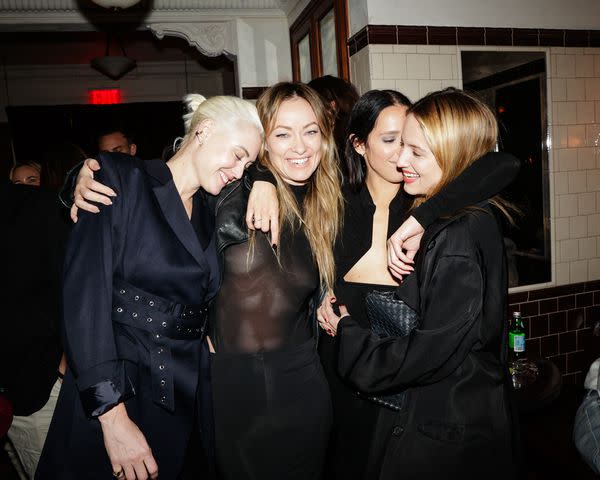 <p>BFA</p> Olivia Wilde (center) with Dianna Agron (far right) and friends