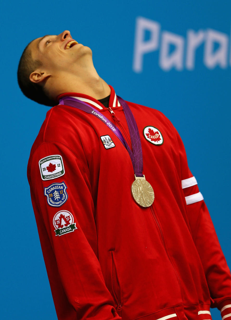 LONDON, ENGLAND - AUGUST 31: Nathan Stein of Canada celebrates winning the gold medal in the Men's 50m Freestyle - S10 on day 2 of the London 2012 Paralympic Games at Aquatics Centre on August 31, 2012 in London, England. (Photo by Mike Ehrmann/Getty Images)