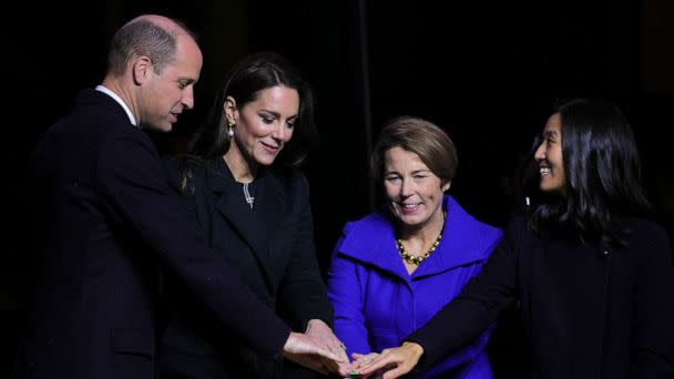 PHOTO: Britain's Prince William and Catherine, Princess of Wales and Mayor of Boston Michelle Wu turn the lights on on Boston City Hall, in Boston, Nov. 30, 2022. (Brian Snyder/Reuters)