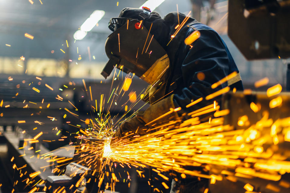 Metal worker using a grinder. Photo: Getty