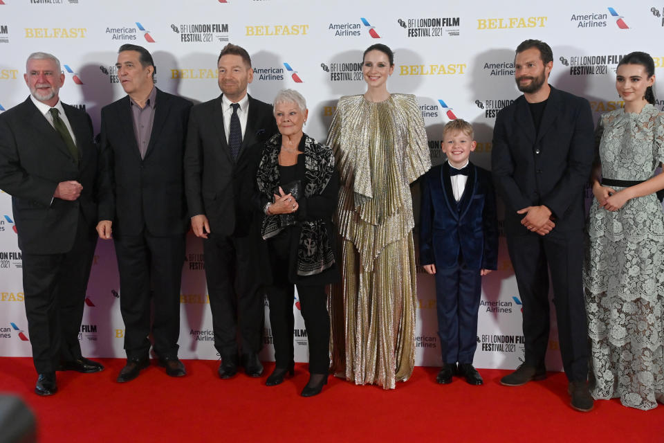 LONDON, ENGLAND - OCTOBER 12: Ciaran Hinds, Kenneth Branagh, Dame Judi Dench, Caitriona Balfe, Jude Hill, Jamie Dornan and Lara McDonnell attend the 