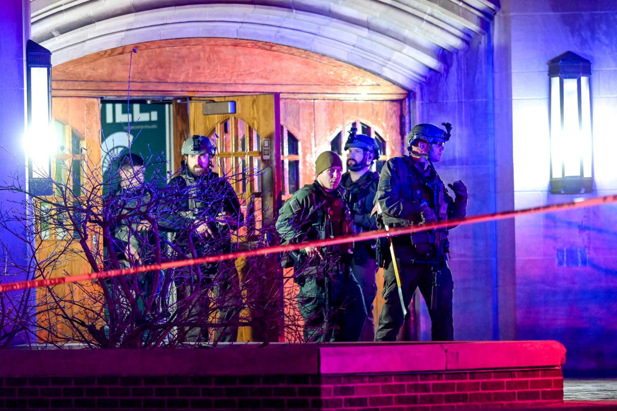 Police in front of a building at Michigan State University in East Lansing, Mich.