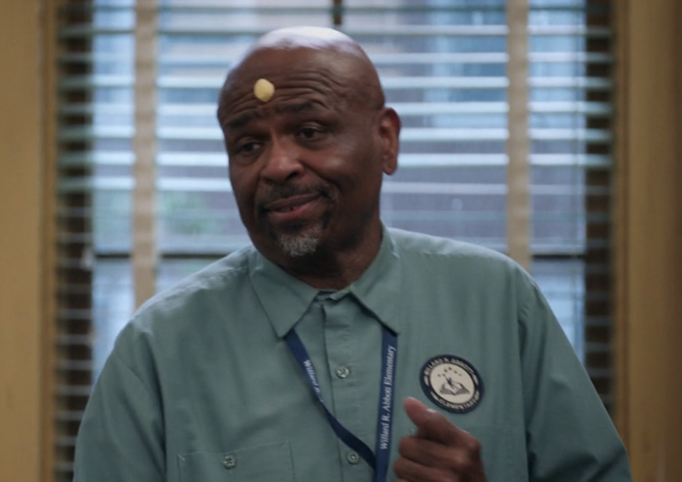 Mr. Johnson is wearing his usual janitor's uniform but has a "gem" on his forehead similar to the the diamond Lil Uzi has on his forehead