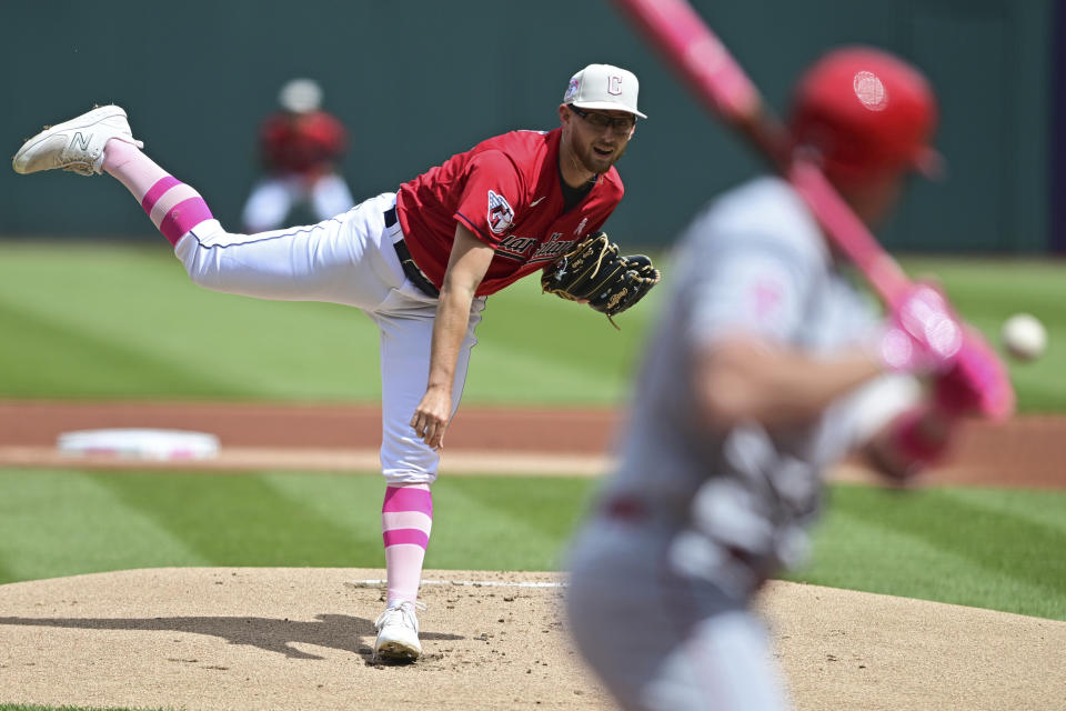 Cleveland Guardians starting pitcher Tanner Bibee delivers to Los Angeles Angels' Hunter Renfroe during the first inning of a baseball game, Sunday, May 14, 2023, in Cleveland. (AP Photo/David Dermer)