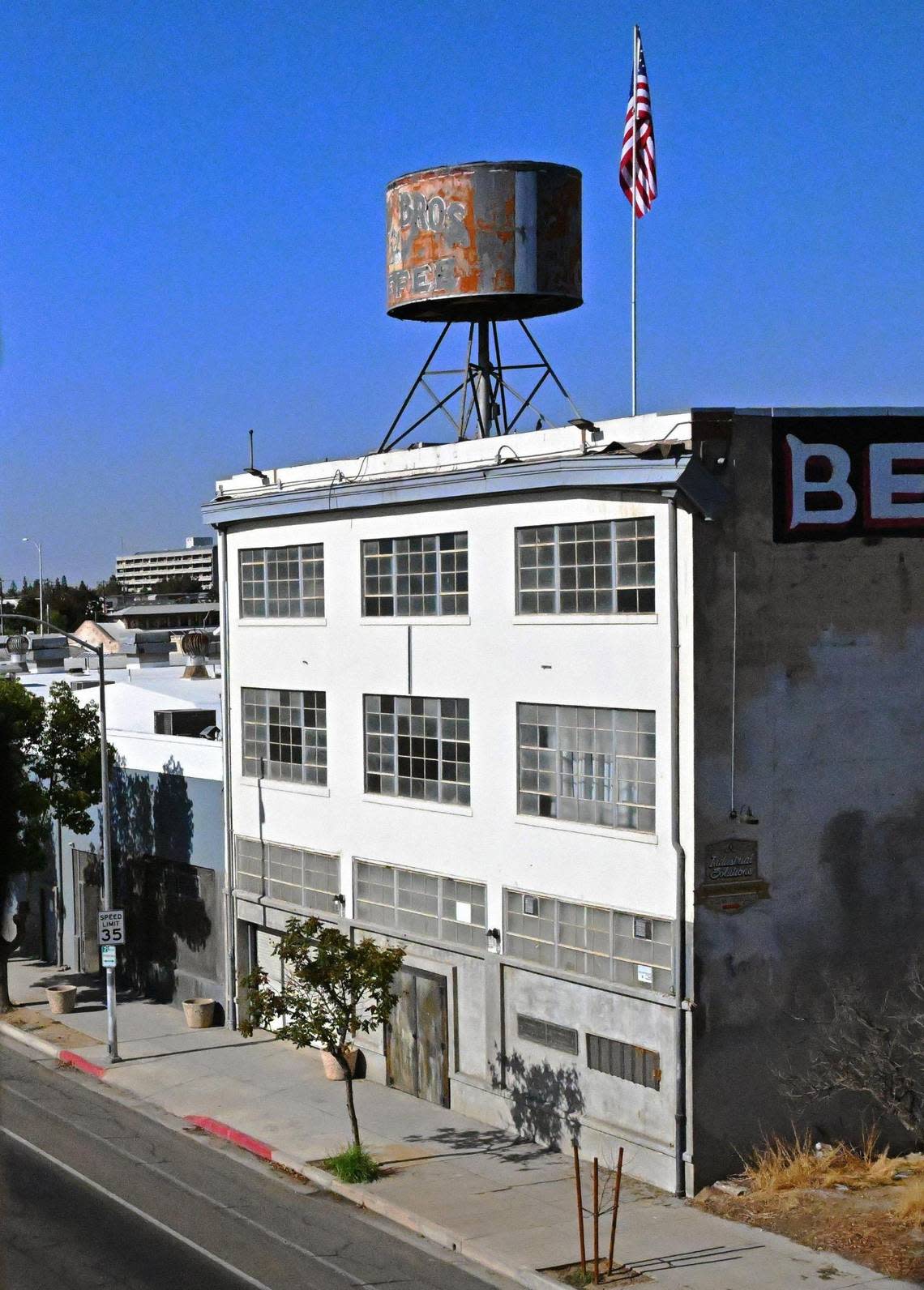 The historical Dale Bros. Coffee landmark, seen perched on top of a building on H Street, is slated to be removed. Photographed Tuesday, Oct. 3, 2023 in Fresno.