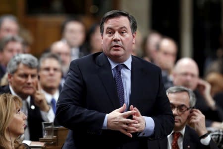 FILE PHOTO: Conservative Member of Parliament Jason Kenney speaks following Question Period in the House of Commons on Parliament Hill in Ottawa, Canada, February 1, 2016. REUTERS/Chris Wattie/File Photo