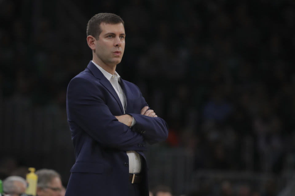 Boston Celtics head coach Brad Stevens watches his players during the first half of an NBA basketball game against the San Antonio Spurs, Wednesday, Jan. 8, 2020 in Boston. (AP Photo/Charles Krupa)