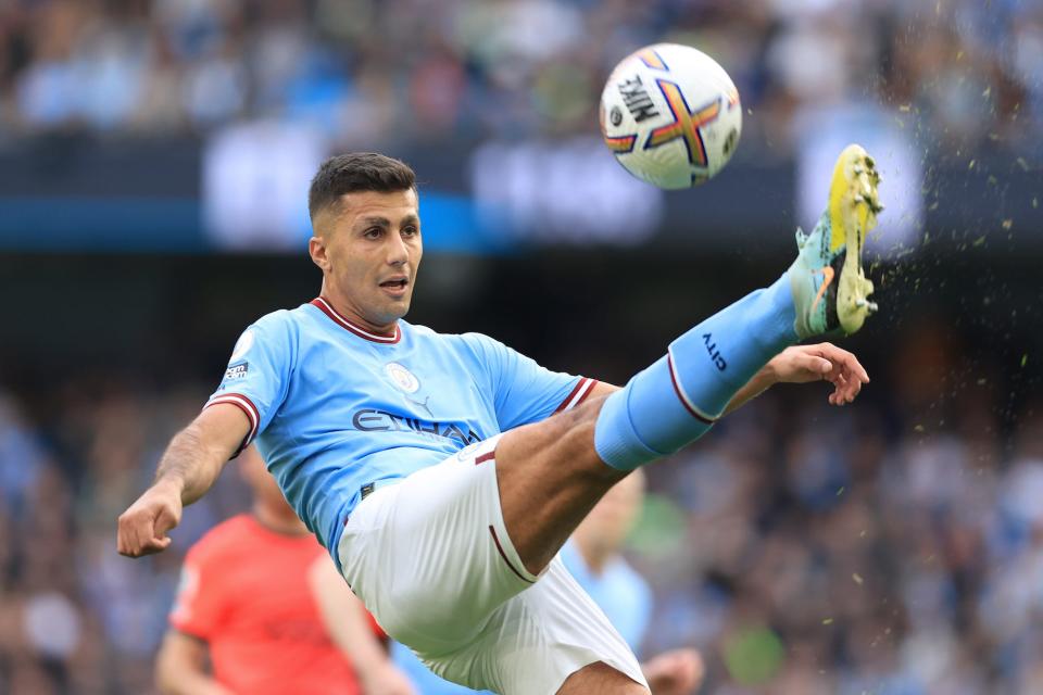 Rodri of Manchester City clears the ball during the Premier League match between Manchester City and Brighton & Hove Albion at Etihad Stadium.