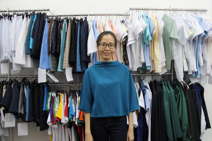 Managing director of Shanghai School Uniforms, Doris Yeo Lee Yuen, at the garment company's showroom in Ubi. (Photo: Nurul Azliah Aripin/Yahoo Lifestyle Singapore)