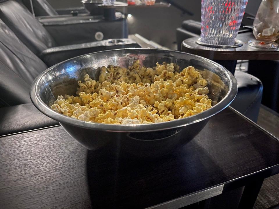 Large metal bowl of popcorn