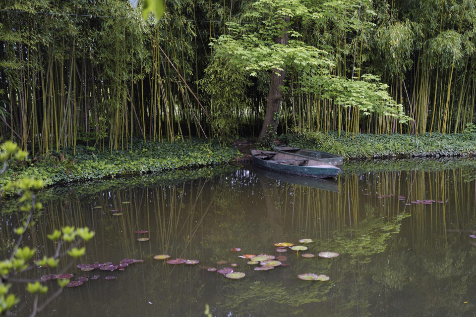 The Japanese-inspired water garden of Claude Monet's house, French impressionist painter who lived from 1883 to 1926, waits ahead of the re-opening, in Giverny, west of Paris, Monday May 17, 2021. Lucky visitors who'll be allowed back into Claude Monet's house and gardens for the first time in over six months from Wednesday will be treated to a riot of color, with tulips, peonies, forget-me-nots and an array of other flowers all competing for attention. (AP Photo/Francois Mori)