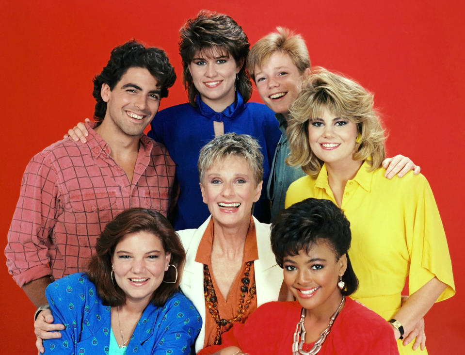 THE FACTS OF LIFE, (clockwise from top left): George Clooney, Nancy McKeon, Mackenzie Astin, Lisa Whelchel, Kim Fields, Cloris Leachman, and Mindy Cohn, (Season 8), 1979-1988. (Photo: Embassy Pictures/Everett Collection)