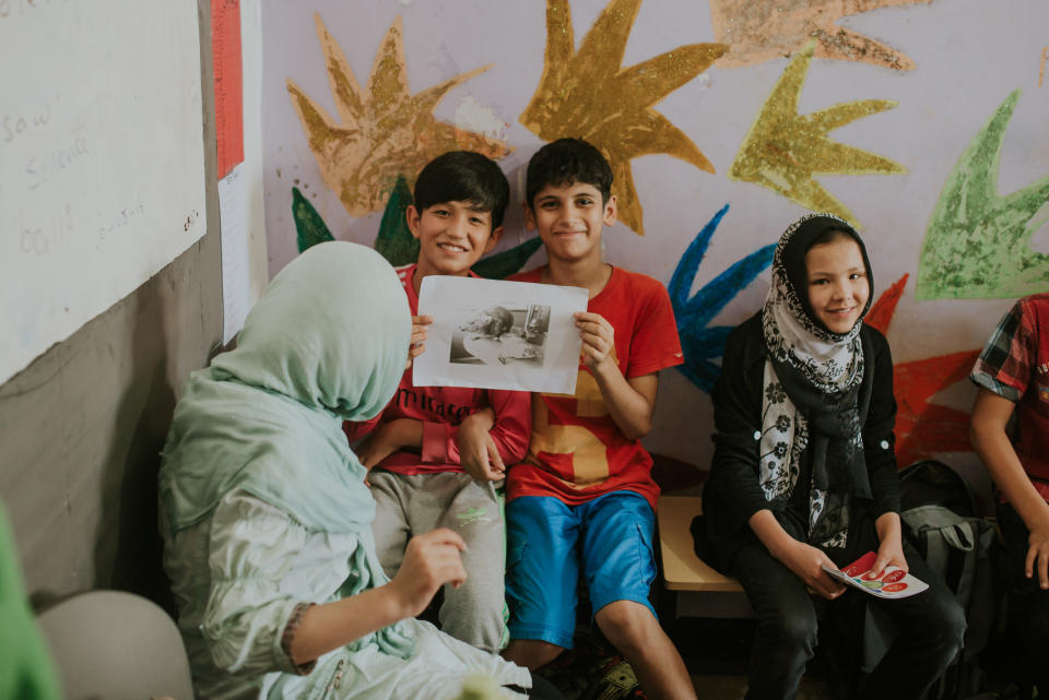 Lesson time for refugee children at the Cisarua Refugee Learning Centre in Cisarua, Indonesia in 2016. PHOTO: Kenneth Lee