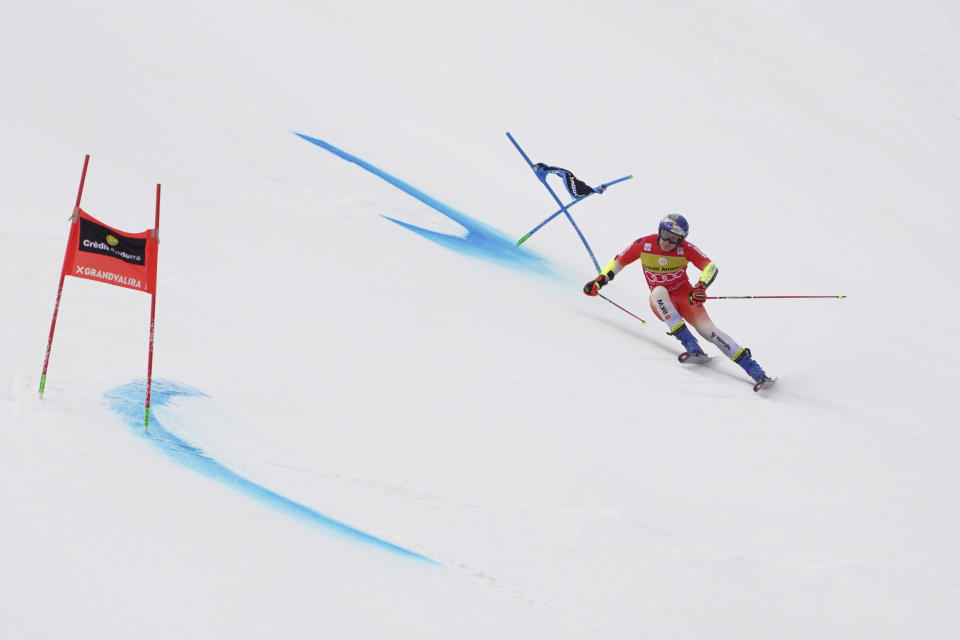 Switzerland's Marco Odermatt speeds down the course during a men's World Cup giant slalom race, in Soldeu, Andorra, Saturday, March 18, 2023. (AP Photo/Giovanni Zenoni)