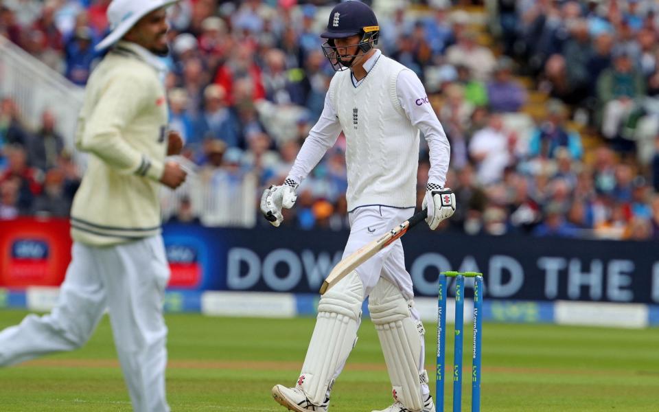 Zak Crawley reacts as he walks back to the pavilion after losing his wicket for 9 runs -  AFP