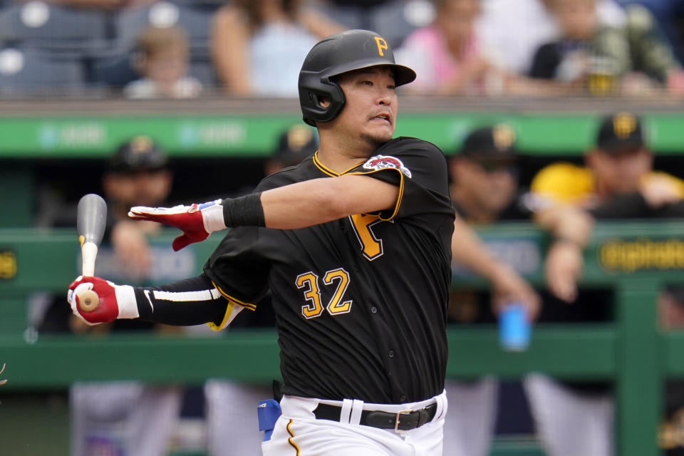 Pittsburgh Pirates' Yoshi Tsutsugo strikes out against Cincinnati Reds starting pitcher Tyler Mahle during the first inning of a baseball game against the Cincinnati Reds in Pittsburgh, Thursday, Sept. 16, 2021. The Reds won 1-0. (AP Photo/Gene J. Puskar)