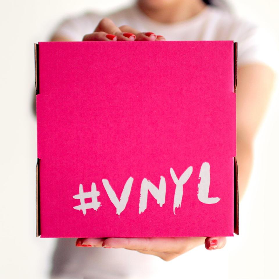 VNYL logo on a pink background, vinyl records subscription service 