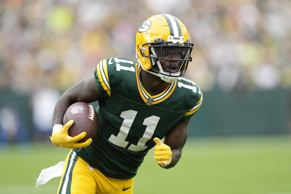 GREEN BAY, WISCONSIN - AUGUST 26: Jayden Reed #11 of the Green Bay Packers runs with the ball against the Seattle Seahawks in the first half during a preseason game at Lambeau Field on August 26, 2023 in Green Bay, Wisconsin. (Photo by Patrick McDermott/Getty Images)