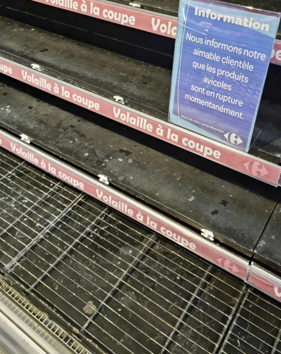 An empty shelf is seen in a supermarket, in Tunis, Tunisia, Monday, Oct. 10, 2022. Sugar, vegetable oil, rice, even bottled water – Tunisians have suffered shortages of multiple staples in recent weeks. And costs are soaring on products still available. (AP Photo/Hassene Dridi)