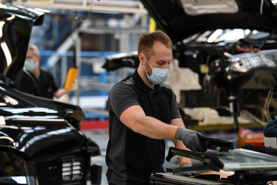 SINDELFINGEN, GERMANY - APRIL 30: A worker assembles a car at a production line at the Mercedes-Benz plant in Sindelfingen, Germany, on April 30, 2020. (Photo by Andreas Gebert/Anadolu Agency via Getty Images)