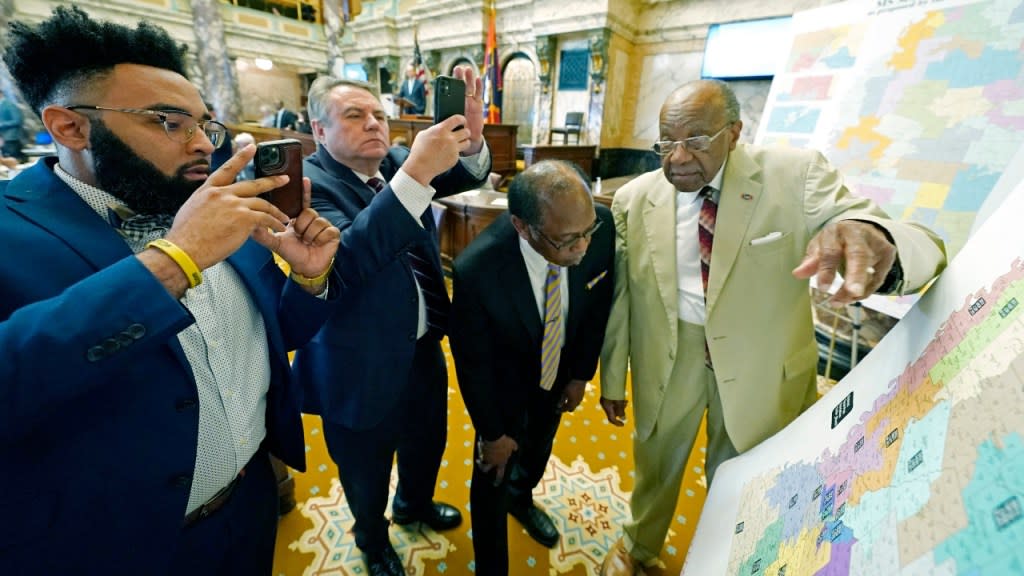 (From left) Mississippi state senators Rod Hickman (D-Macon), Michael McLendon (R-Hernando), Albert Butler (D-Port Gibson) and David Jordan (D-Greenwood) review an alternate Senate redistricting map during debate on the floor of the Senate at the state Capitol in Jackson, Mississippi. (Photo: Rogelio V. Solis/AP, File)