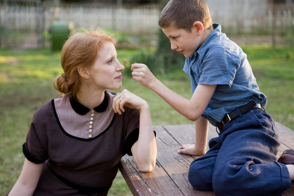 THE TREE OF LIFE, from left: Jessica Chastain, Tye Sheridan, 2011. ph: Merie Wallace/©Fox Searchlight/courtesy Everett Collection