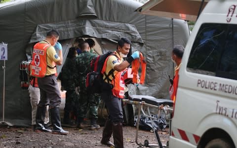 Military and police personnel at the the quarantine tent in Tham Luang cave area where the rescued boys are checked - Credit: Chiang Rai Public Relations Office/AFP