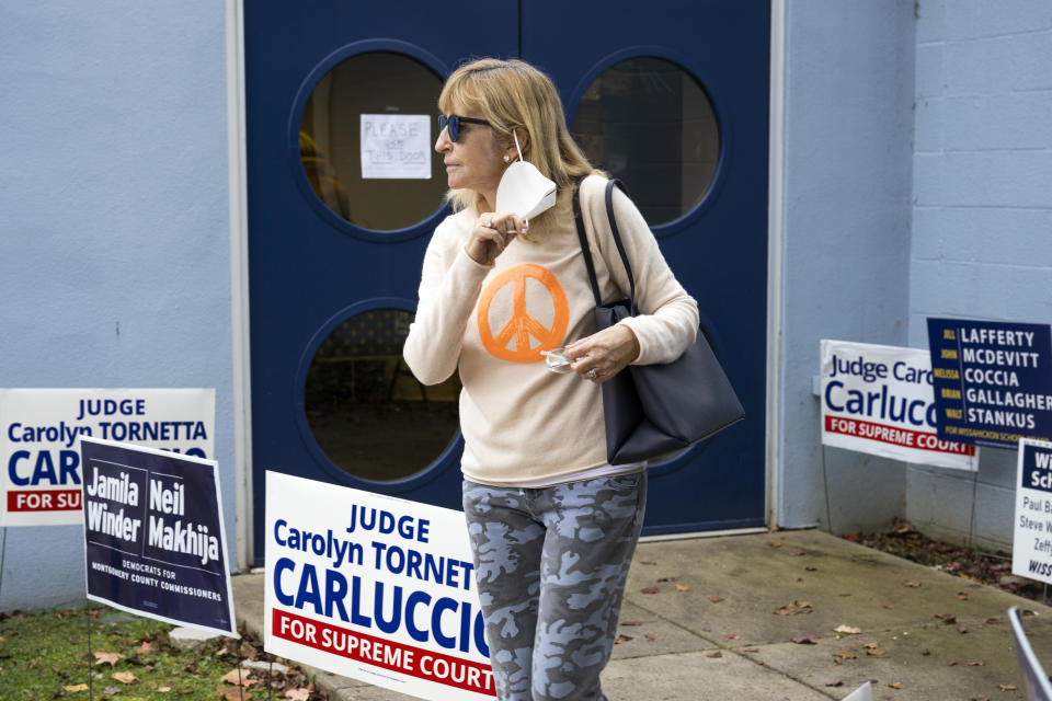 A voter exits the Wissahickon Valley Public Library on Election Day in Blue Bell, Pa. on Tuesday, Nov. 7, 2023. (AP Photo/Joe Lamberti)