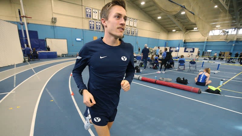 BYU distance runner Conner Mantz warms up at the Smith Fieldhouse in Provo on Friday, Feb. 19, 2021. Mantz qualified earlier this year to run the marathon in the 2024 Summer Games in Paris.