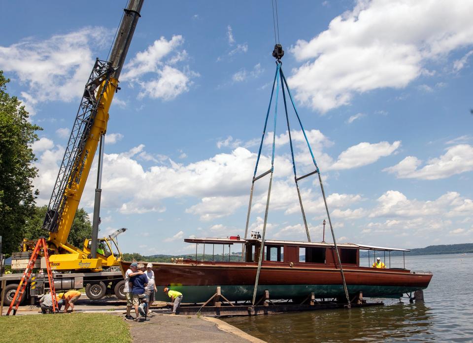 The Chief Uncus is lowered with its cradle into the Susquehanna River at Long Level in Lower Windsor Township. A total of 19,000 pounds was hoisted from the trailer. The electric boat, which can transport 29 people, weighs 12,000 pounds.