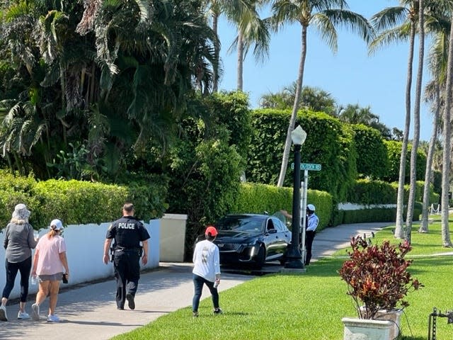 Neill Engler took this photo of a black Cadillac sedan driving north along Palm Beach's Lake Trail near Eden Road on May 25. Police said the woman driving the car was confused.