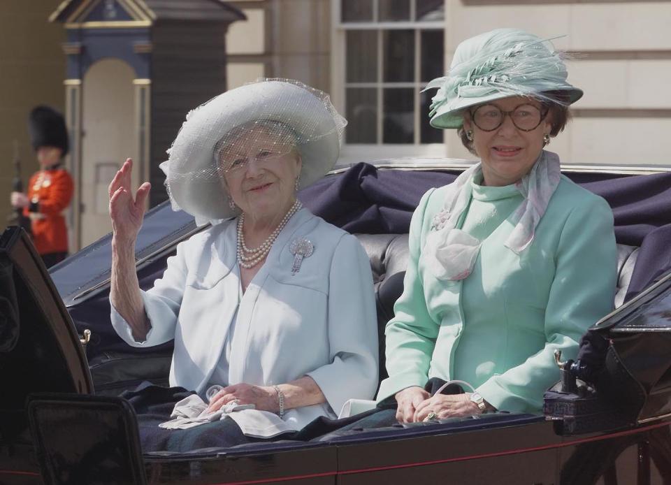 The Queen Mother with Princess Margaret sit in an open top carriage as they leave Buckingham Palace, central London for the short ride to Horse Guards parade, where senior members of the Royal family gather for the annual Trooping the Colour ceremony.   (Photo by John Stillwell - PA Images/PA Images via Getty Images)