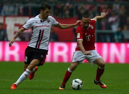 Football Soccer - Bayern Munich v FC Ingolstadt 04 - German Bundesliga - Allianz-Arena, Munich, Germany - 17/09/16 Bayern Munich's Franck Ribery and Ingolstdadt's Pascal Gross in action. REUTERS/Michael Dalder