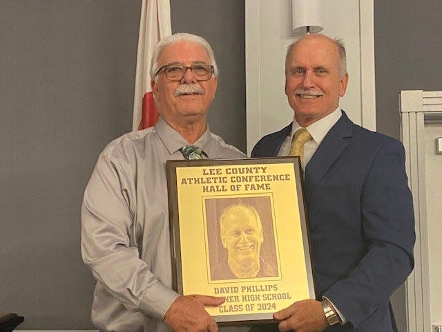 Former Mariner wrestling coach Dave Phillips was among eight members of the Lee County Athletic Conference Hall of Fame's Class of 2024. With him is former Mariner athletic director Vito Mennona.