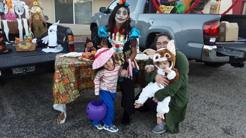 Kids show off their Halloween costumes during  trunk-or-treat event last year in Apple Valley.