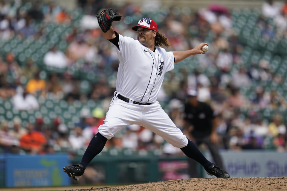 Detroit Tigers relief pitcher Andrew Chafin throws against the Cleveland Guardians in the seventh inning of a baseball game in Detroit, Monday, July 4, 2022. (AP Photo/Paul Sancya)