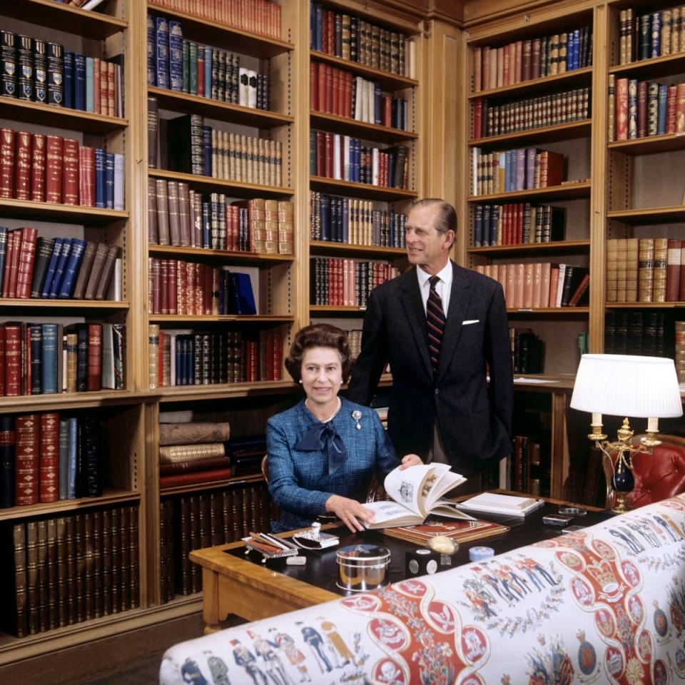 Queen Elizabeth II and the Duke of Edinburgh during their traditional summer break at Balmoral Castle in 1976. The highland retreat is one of the Queen's favourite places, each year, she heads off to Scotland for the summer. ‘It is rather nice to hibernate for a bit when one leads such a moveable life,’ she once said (Getty)
