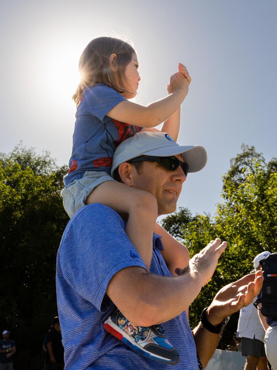 Will Loutensock and his daughter Elissa, of Kaysville, cheer during the Utah Championship, part of the PGA Korn Ferry Tour, at Oakridge Country Club in Farmington on Sunday, Aug. 6, 2023. | Megan Nielsen, Deseret News