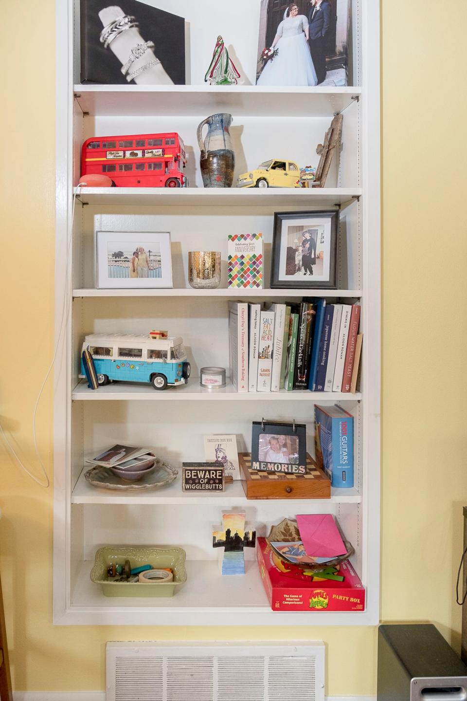 The built-in shelves were an added feature for the new homeowners who like to display books and collectible items.