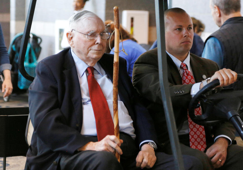 Berkshire Hathaway vice chairman Charlie Munger visits the shareholder shopping day in a golf cart as part of the Berkshire Hathaway annual meeting weekend in Omaha, Nebraska, May 5, 2017. REUTERS/Rick Wilking