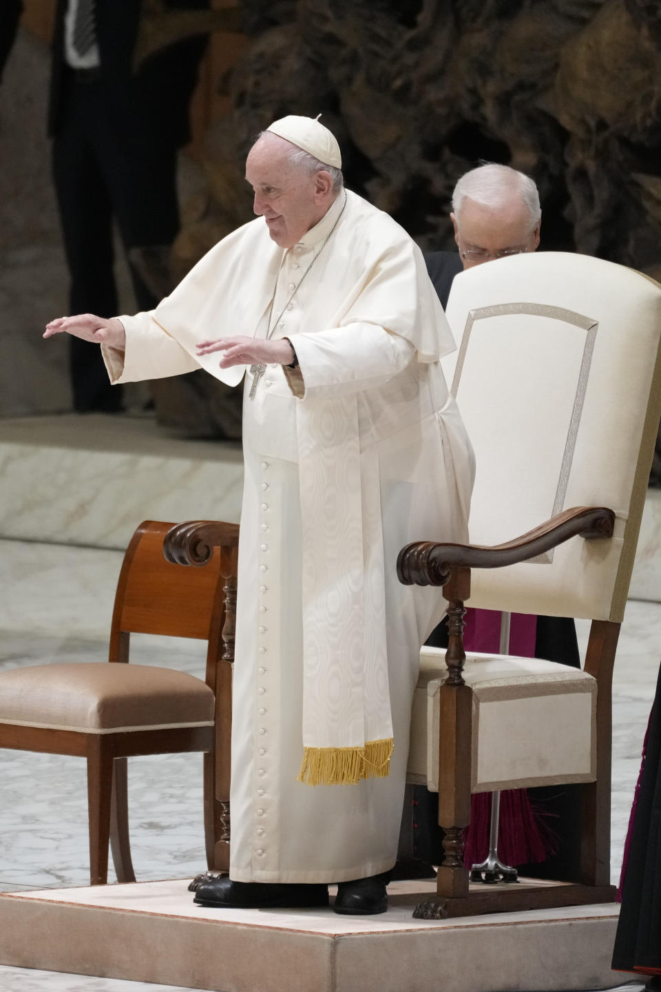 Pope Francis arrives for an audience with Vatican's employees in the Paul VI Hall, at the Vatican, Thursday, Dec. 22, 2022. (AP Photo/Andrew Medichini)