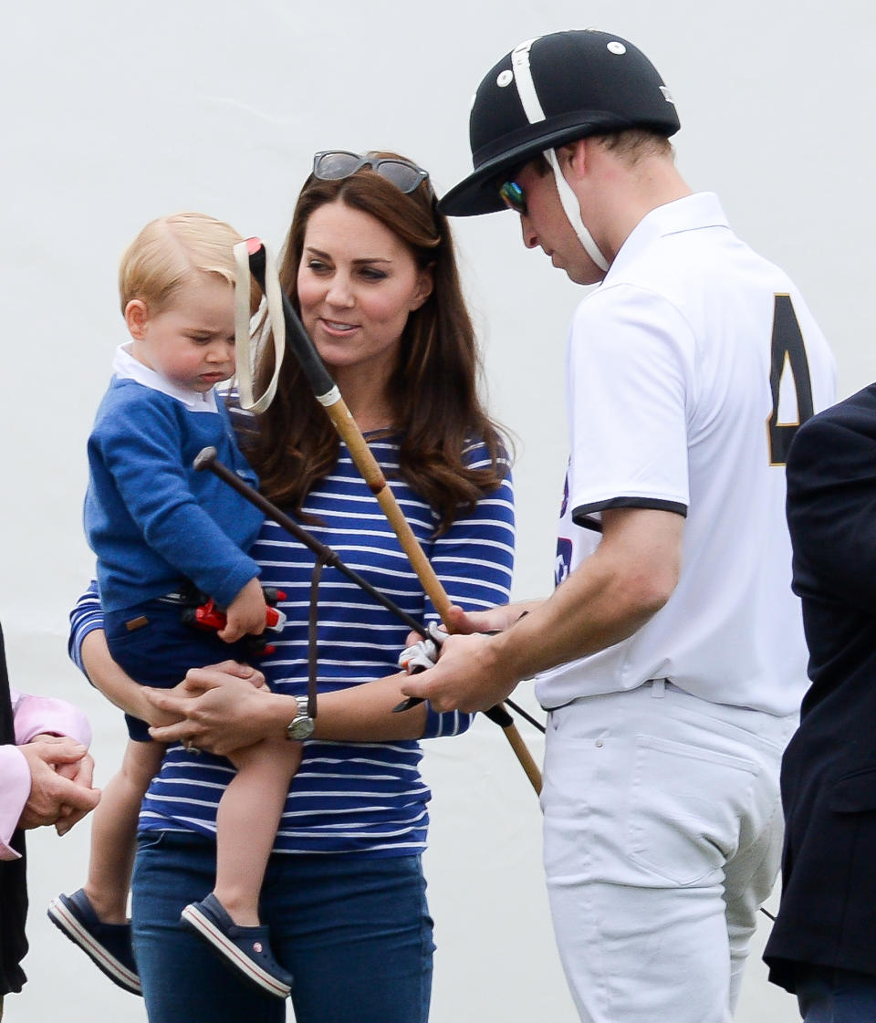 <p>Prince George already looks interested in his dad's mallet!</p>