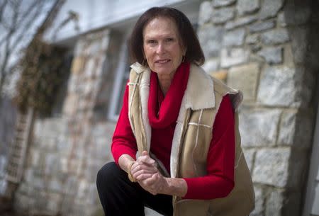 Renee Richards poses for a portrait on the front porch of her home in Carmel, New York, March 25, 2015. REUTERS/Mike Segar