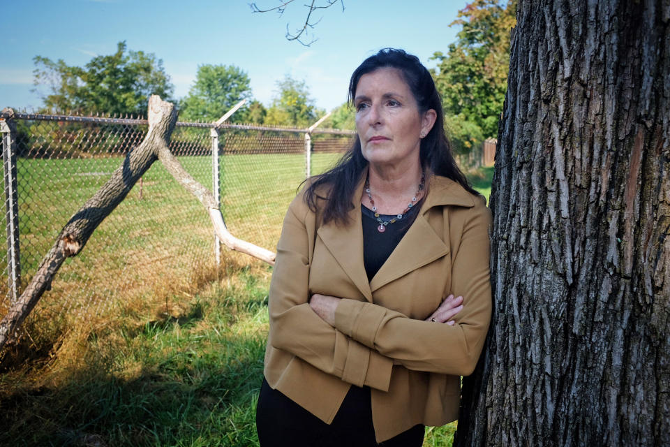 Hope Grosse stands next to the Naval Air Development Center in Warminster, Pa. (Frank Thorp / NBC News)