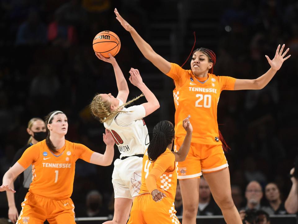Tennessee center Tamari Key (20) defends while Louisville guard Hailey Van Lith (10) tries to shoot during the NCAA tournament Sweet 16 basketball game on Saturday, March 26, 2022. in Wichita, KS.