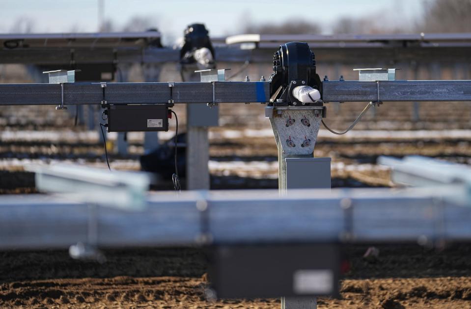 A 60-acre solar farm will harvest sunlight for an electric membership co-op, providing 7 megawatts to 35,000 members, seen on Wednesday, Feb. 1, 2023, in Danville, Ind. The $12 million project is slated launch by summer. Motors (pictured) will ensure panels face the sun throughout the day. 