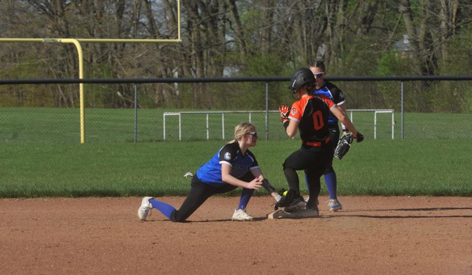 Crestline's Lillian Higgins is late on a tag at second.