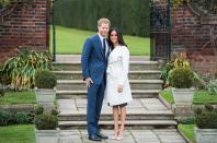 <p>Prince Harry and Meghan Markle smile for photographers at an official photocall to announce their engagement. </p>